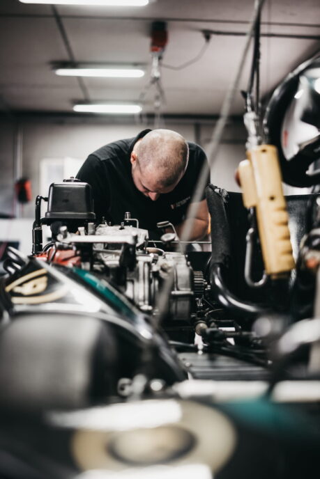 Experience Factory - Mechanic Working on Kart